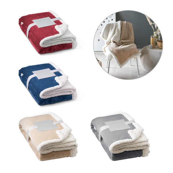 HEIDEN. Coperta reversibile in pile confezionata (190 g/m²) con nastro in raso e cartoncino personal